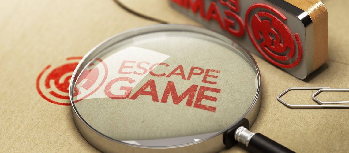 Kraft envelop with enigma inside and the word escape game stamped on it.
